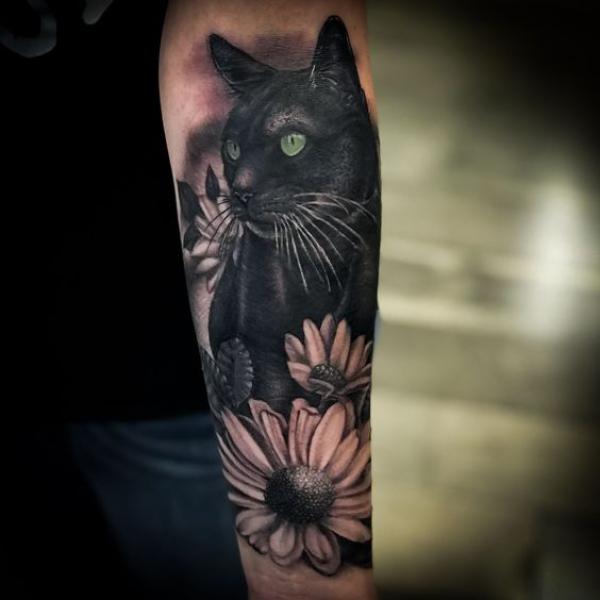 50 Inspiring Black Cat Tattoo Designs and Their Meanings