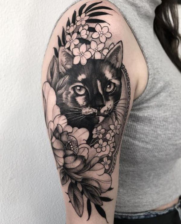 50 Inspiring Black Cat Tattoo Designs and Their Meanings