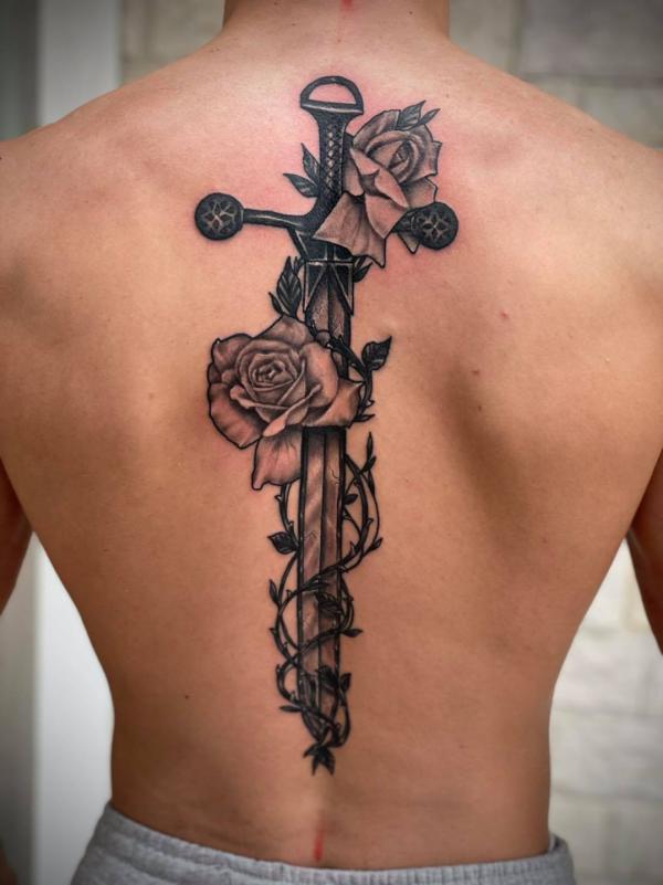 Rose Back Tattoo: Blooming with Beauty and Meaning