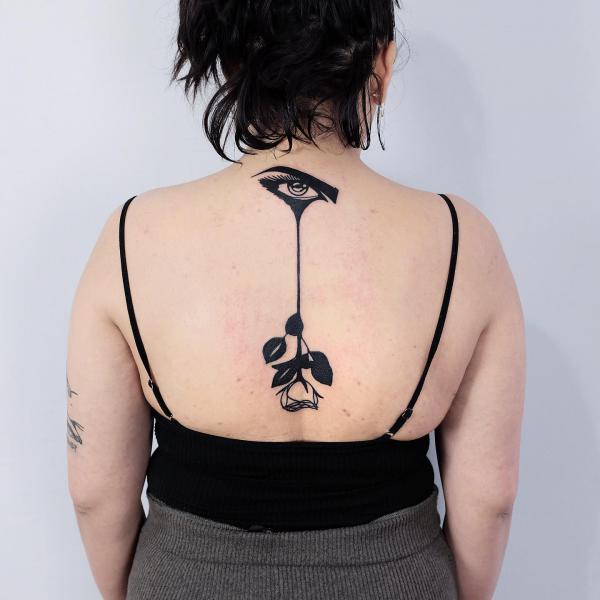 Rose Back Tattoo: Blooming with Beauty and Meaning