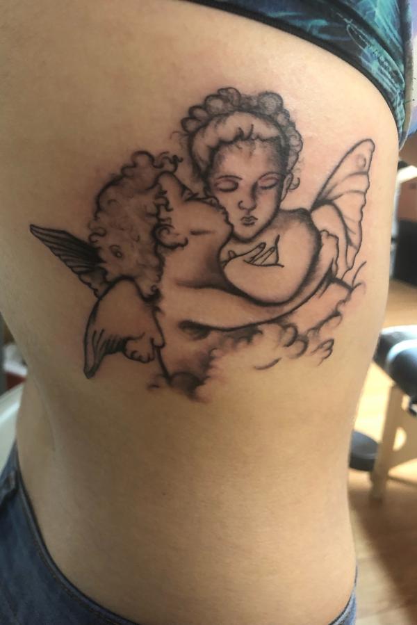 100 Cherub Tattoos: the Designs and Meanings