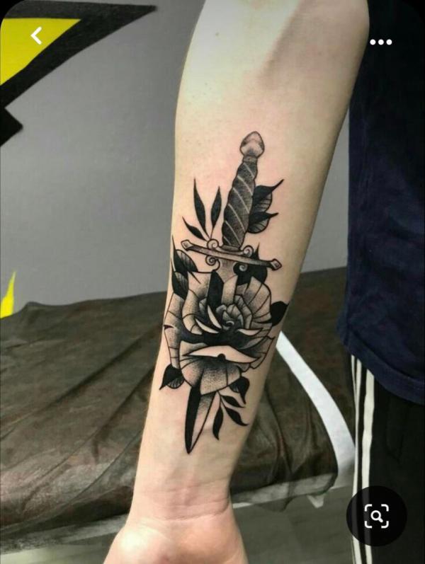 80 Rose and Dagger Tattoo Designs: A Blend of Beauty and Edge