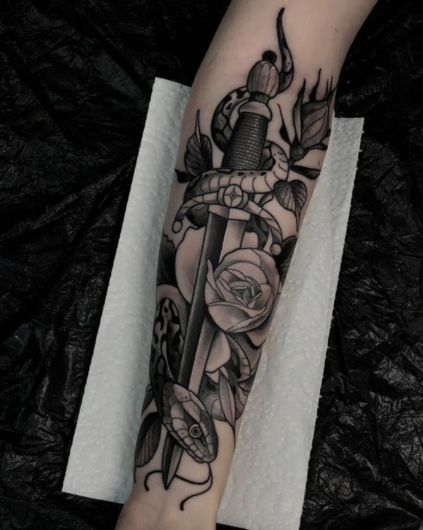 80 Rose and Dagger Tattoo Designs: A Blend of Beauty and Edge