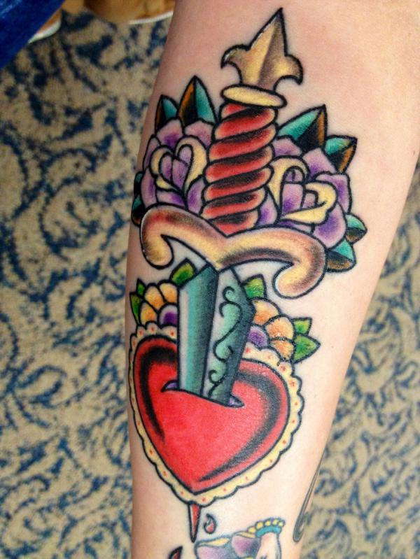 80 Rose and Dagger Tattoo Designs: A Blend of Beauty and Edge