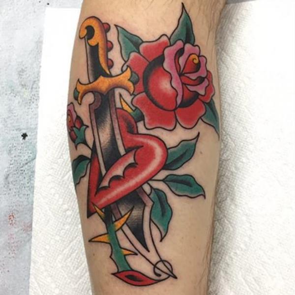 80 Rose and Dagger Tattoo Designs: A Blend of Beauty and Edge