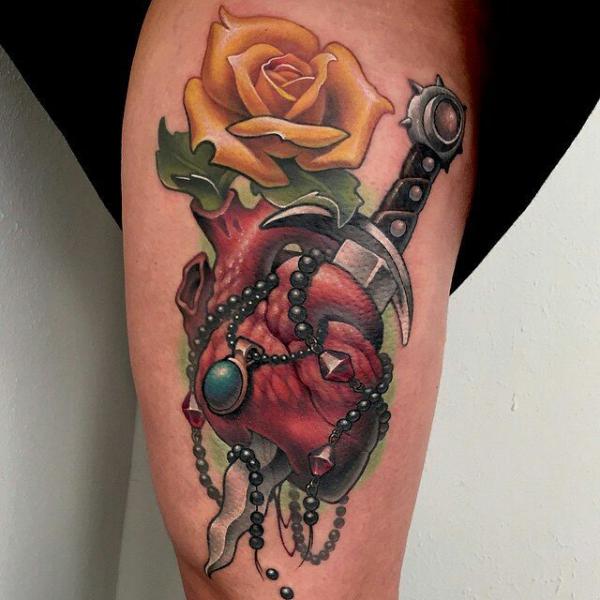 80 Rose and Dagger Tattoo Designs: A Blend of Beauty and Edge