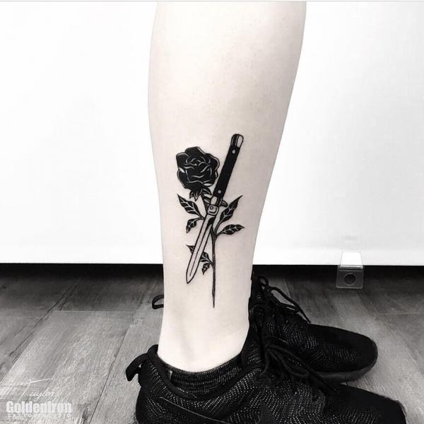 80 Rose and Dagger Tattoo Designs: A Blend of Beauty and Edge