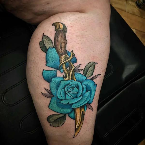 80 Rose and Dagger Tattoo Designs: A Blend of Beauty and Edge
