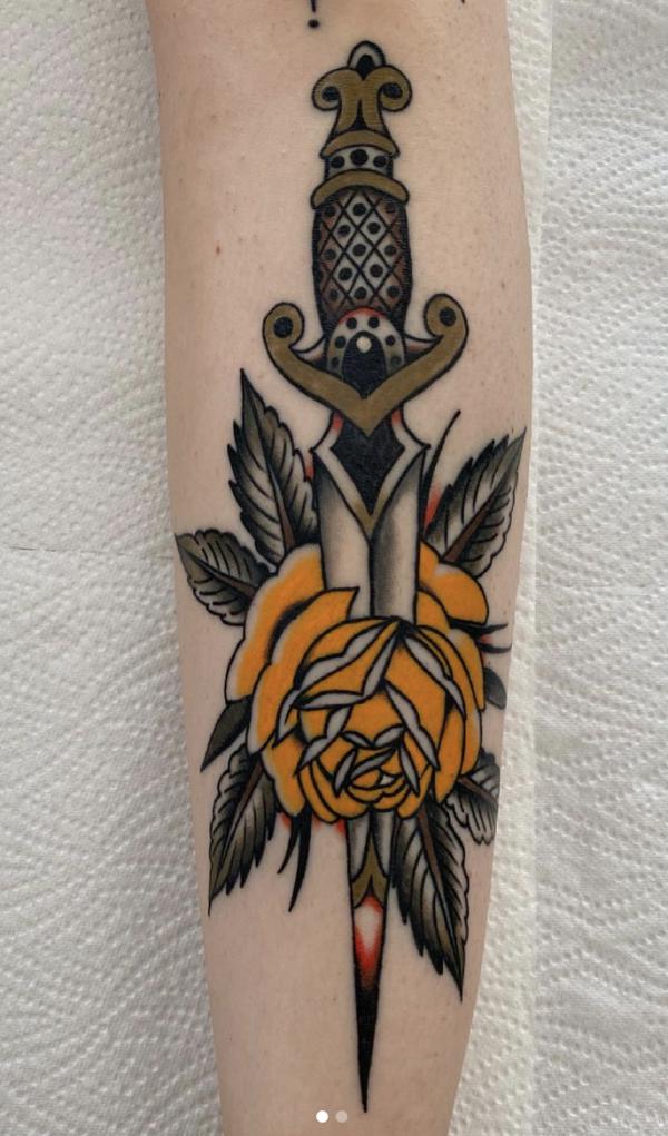 80 Rose and Dagger Tattoo Designs: A Blend of Beauty and Edge