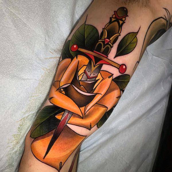 80 Rose and Dagger Tattoo Designs: A Blend of Beauty and Edge
