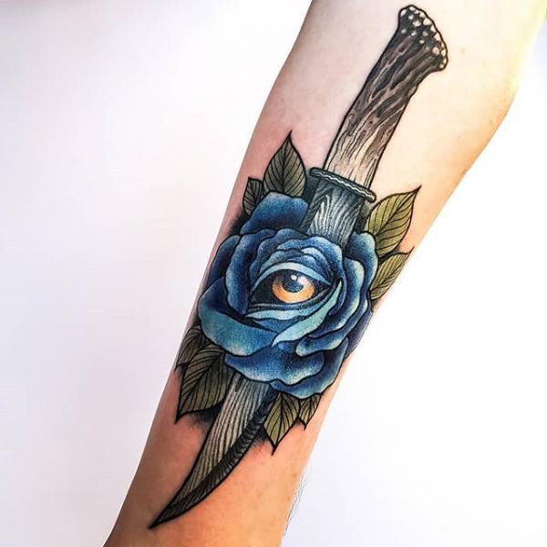 80 Rose and Dagger Tattoo Designs: A Blend of Beauty and Edge