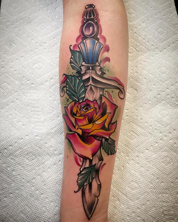 80 Rose and Dagger Tattoo Designs: A Blend of Beauty and Edge