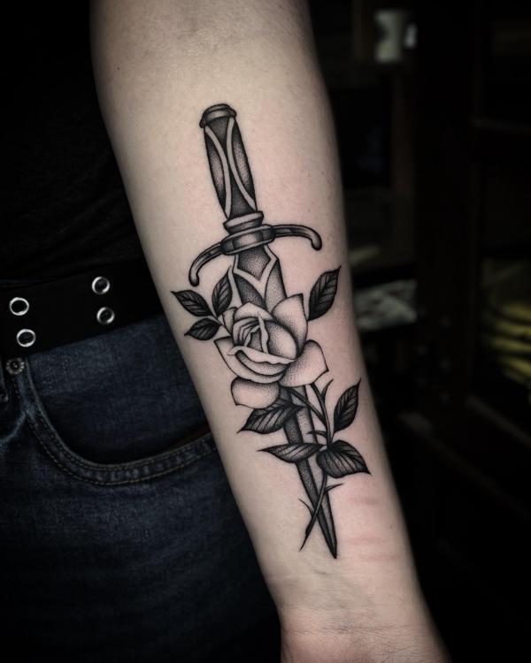 80 Rose and Dagger Tattoo Designs: A Blend of Beauty and Edge