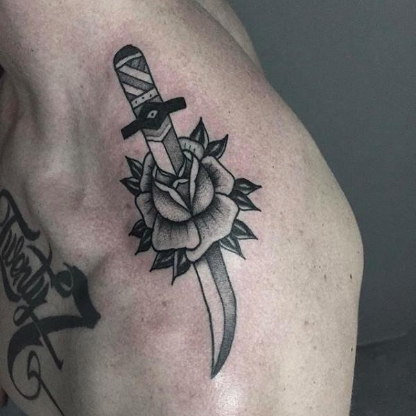 80 Rose and Dagger Tattoo Designs: A Blend of Beauty and Edge
