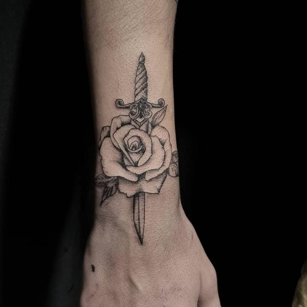 80 Rose and Dagger Tattoo Designs: A Blend of Beauty and Edge