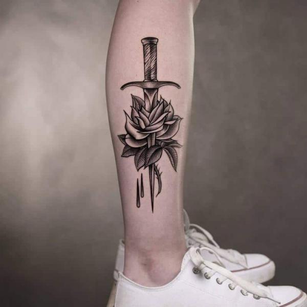 80 Rose and Dagger Tattoo Designs: A Blend of Beauty and Edge
