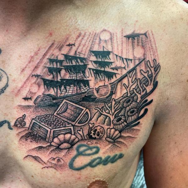 Shipwreck Tattoo: the Depths of Symbolism and Artistry