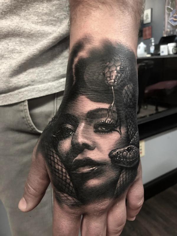 40 Medusa Hand Tattoo Designs with Meaning
