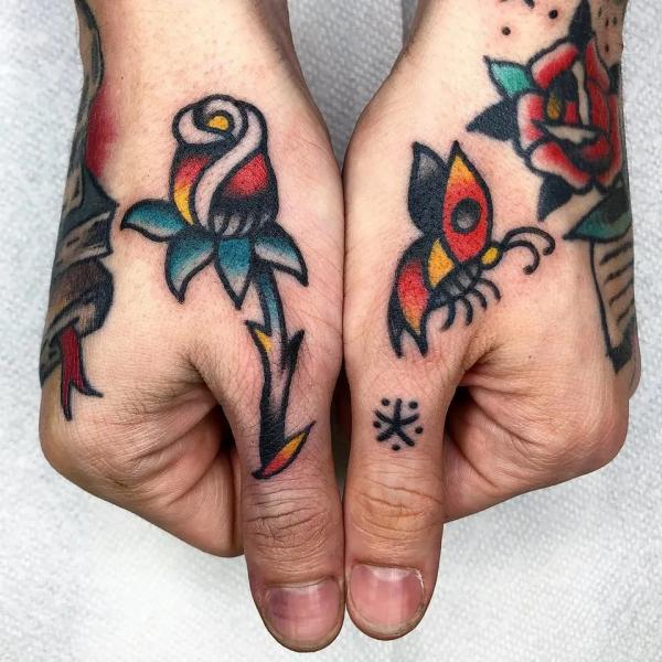 40 Timeless Rose Finger Tattoo Designs