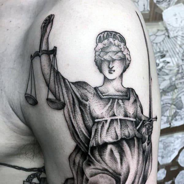 The Scales of Justice Tattoo: Balancing Ink and Ideals