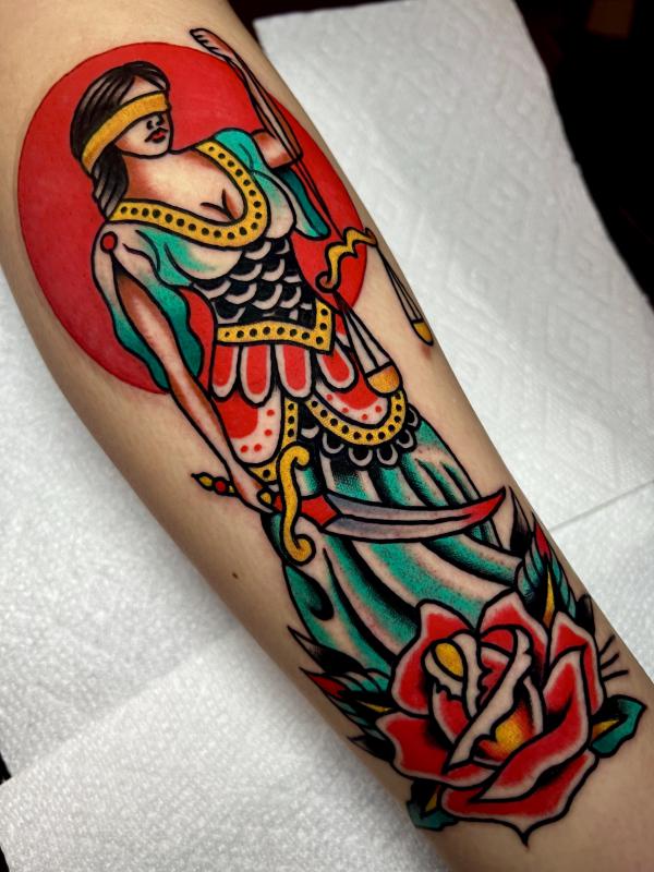 The Scales of Justice Tattoo: Balancing Ink and Ideals