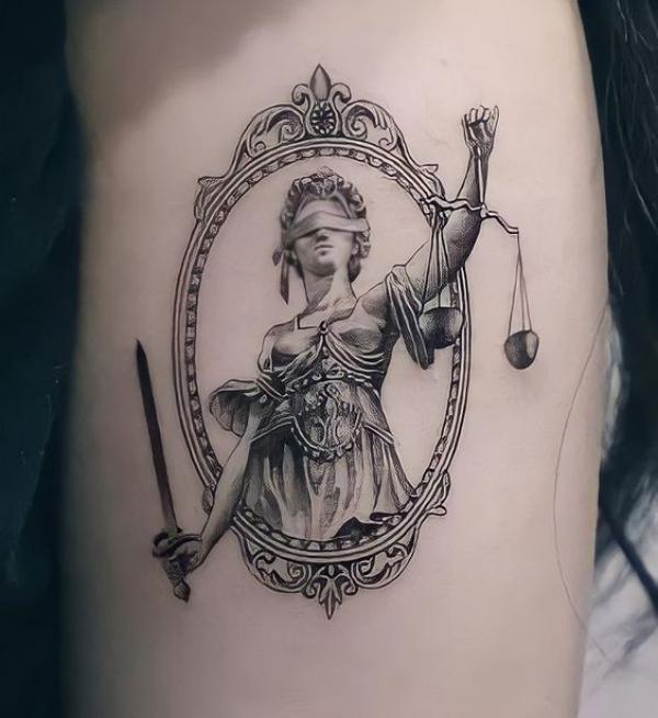 The Scales of Justice Tattoo: Balancing Ink and Ideals