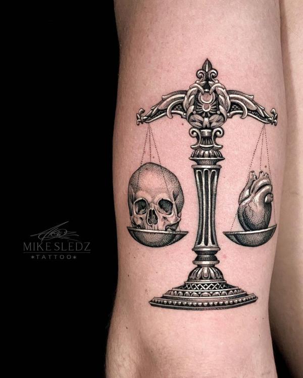 The Scales of Justice Tattoo: Balancing Ink and Ideals
