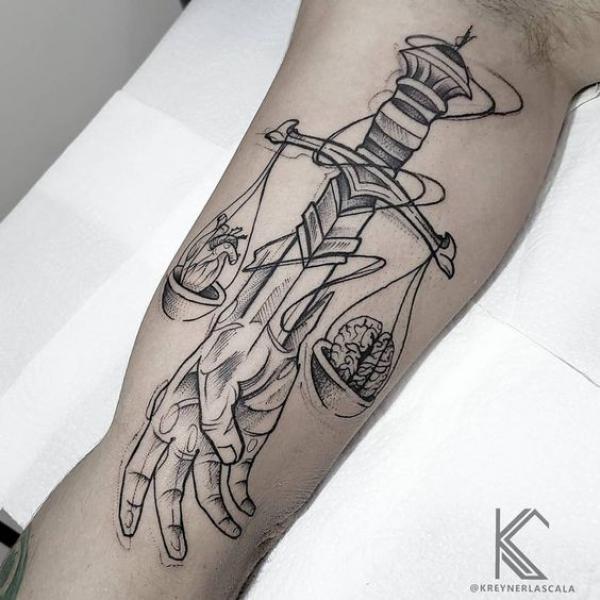 The Scales of Justice Tattoo: Balancing Ink and Ideals