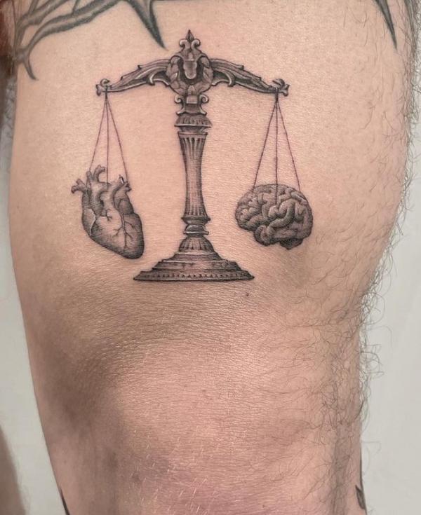 The Scales of Justice Tattoo: Balancing Ink and Ideals