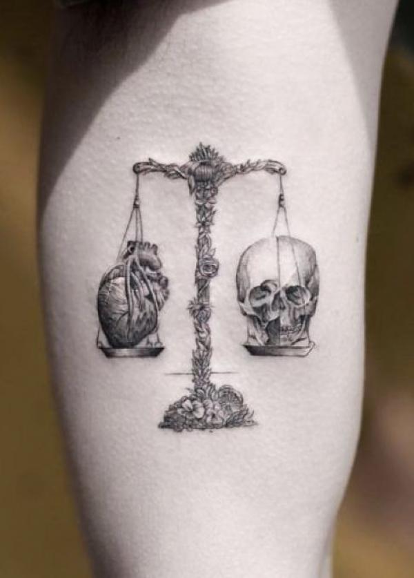 The Scales of Justice Tattoo: Balancing Ink and Ideals
