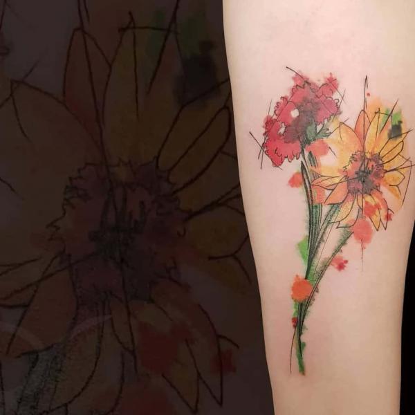 Floral Watercolor Tattoos: A Symphony of Color on Skin