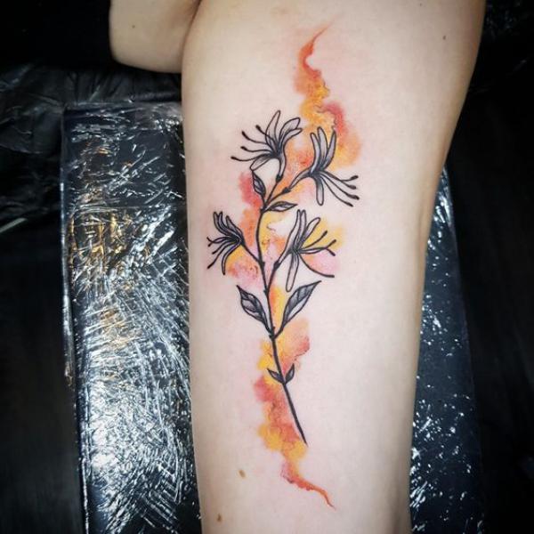 Floral Watercolor Tattoos: A Symphony of Color on Skin