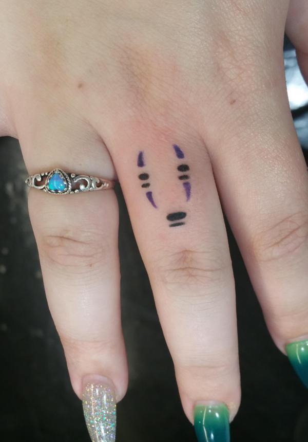 80 No Face Tattoo Designs with Meaning