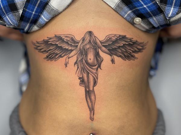 165 Unique Sternum Tattoo Designs for Women