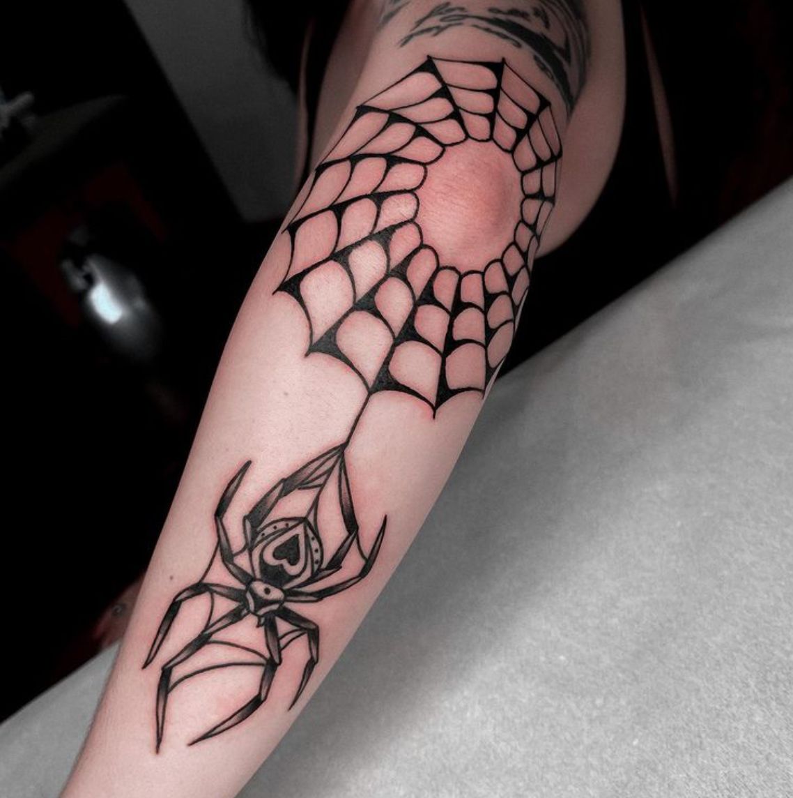 40 Striking Elbow Spiderweb Tattoo Designs