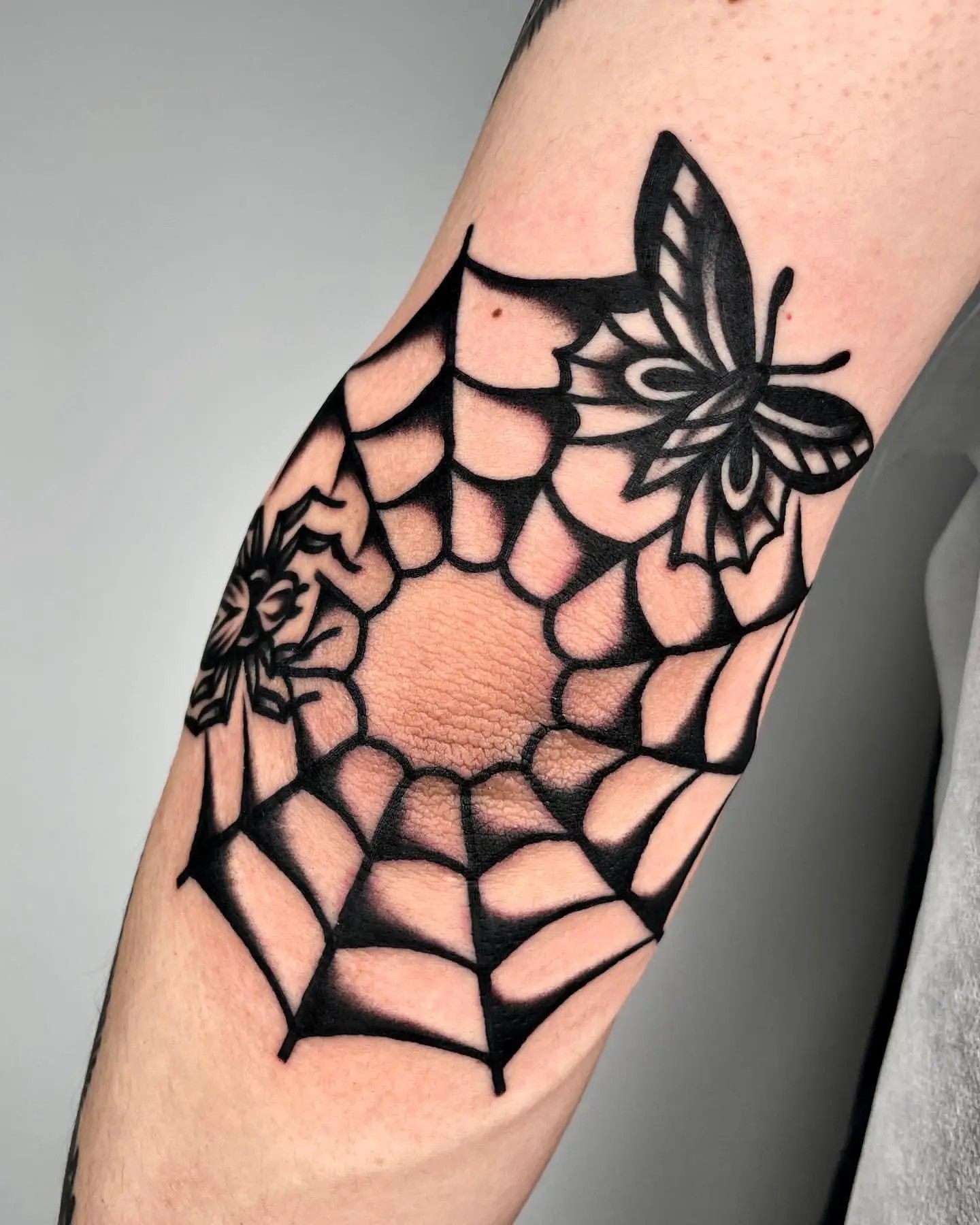 40 Striking Elbow Spiderweb Tattoo Designs
