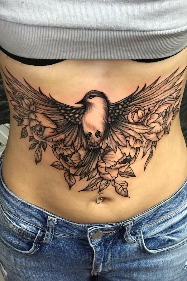 140 Meaningful Stomach Tattoos for Women