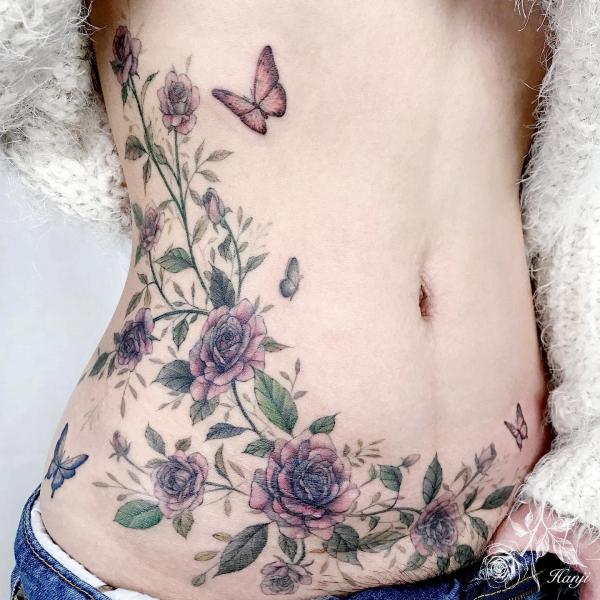 140 Meaningful Stomach Tattoos for Women