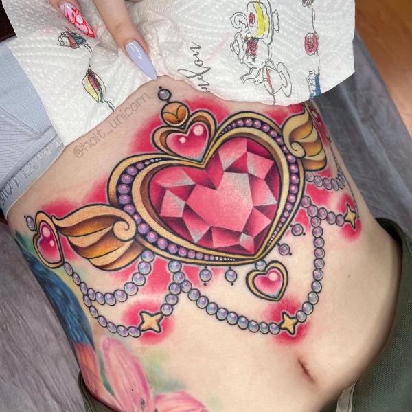 140 Meaningful Stomach Tattoos for Women