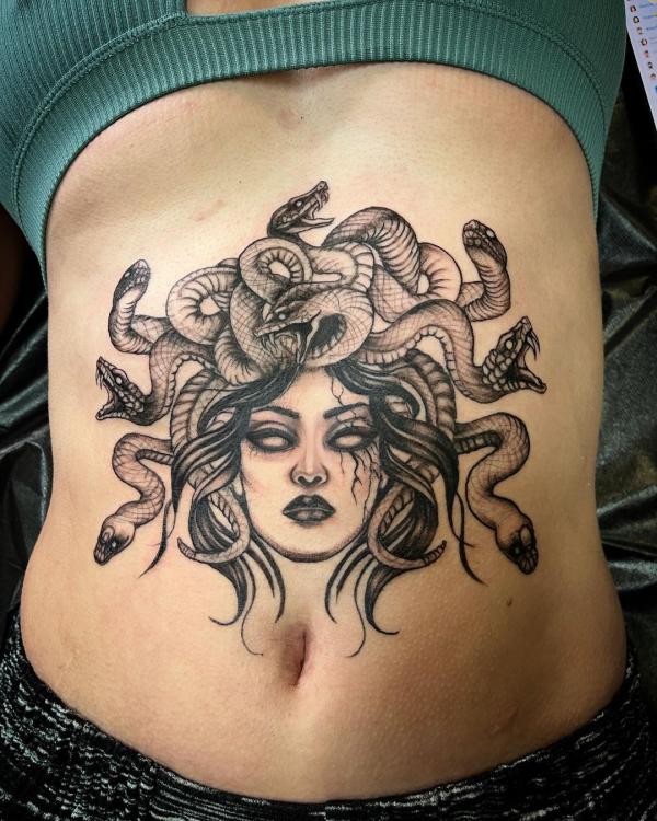 140 Meaningful Stomach Tattoos for Women