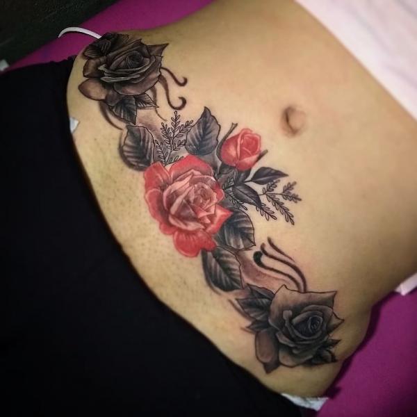 140 Meaningful Stomach Tattoos for Women