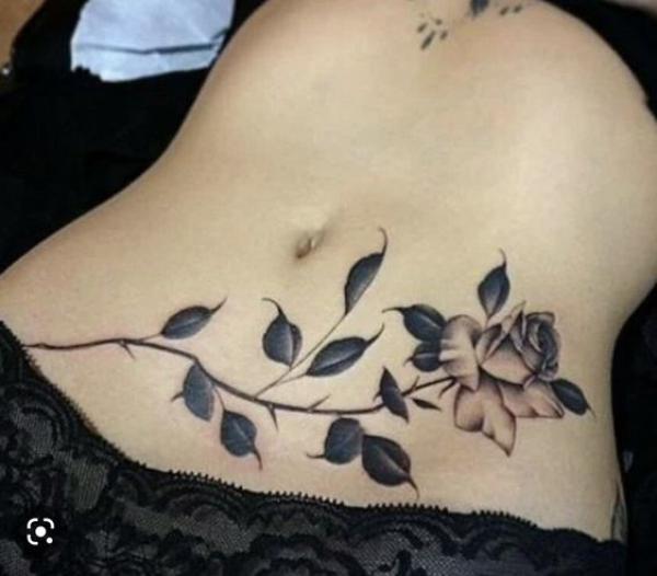 140 Meaningful Stomach Tattoos for Women