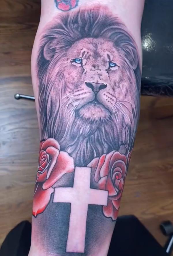 The Majestic Blend: Cross with Lion Tattoos