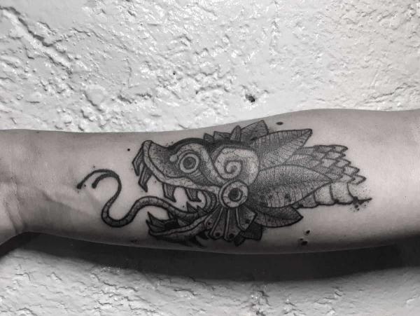 40 Enigmatic Quetzalcoatl Tattoos and Their Meanings