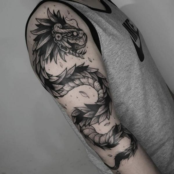 40 Enigmatic Quetzalcoatl Tattoos and Their Meanings
