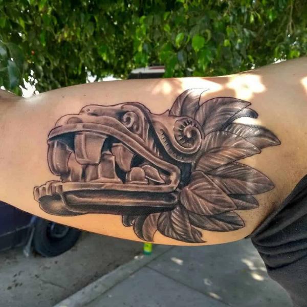 40 Enigmatic Quetzalcoatl Tattoos and Their Meanings