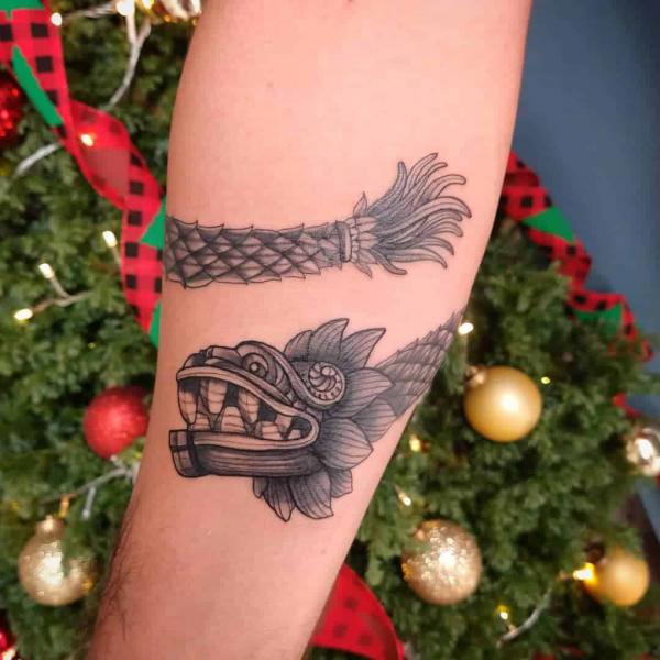 40 Enigmatic Quetzalcoatl Tattoos and Their Meanings