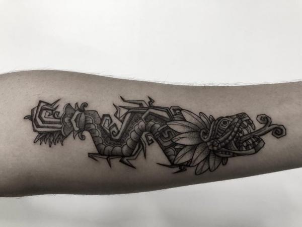 40 Enigmatic Quetzalcoatl Tattoos and Their Meanings