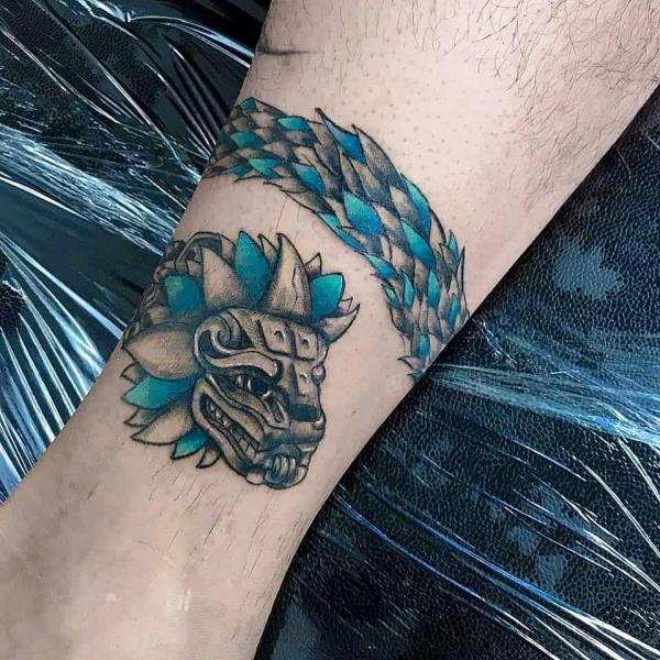40 Enigmatic Quetzalcoatl Tattoos and Their Meanings