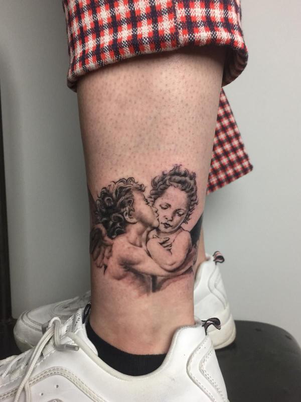 20 Cupid Tattoo Designs That Celebrate Love